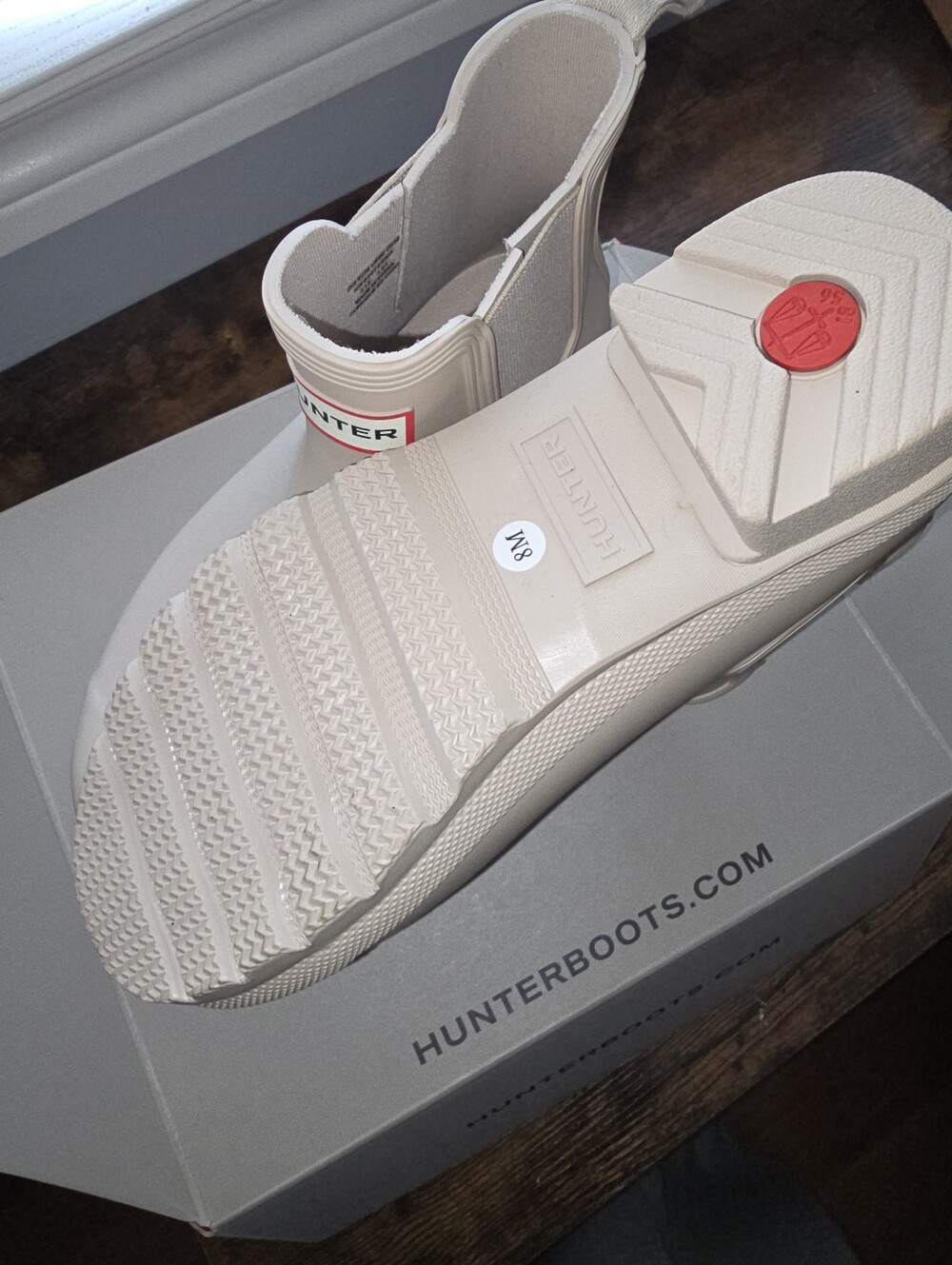 Hunter Cream Chelsea Rain Boots with Red Logo Accent